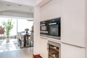 AH Jumeirah Living (WTC) Apartment Kitchen & Flooring by Goettling Interiors