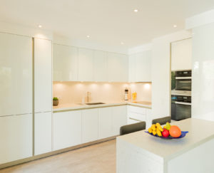 Executed Project, Dubai, Springs, Schüller kitchen, COR bar stools, German brands, White kitchen with Silestone Bianco River worktop, lights on