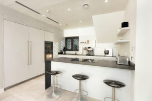 Executed project - Kitchen in Dubai Old Town, Black and White Kitchen which also has Cube system and Cosentino countertop