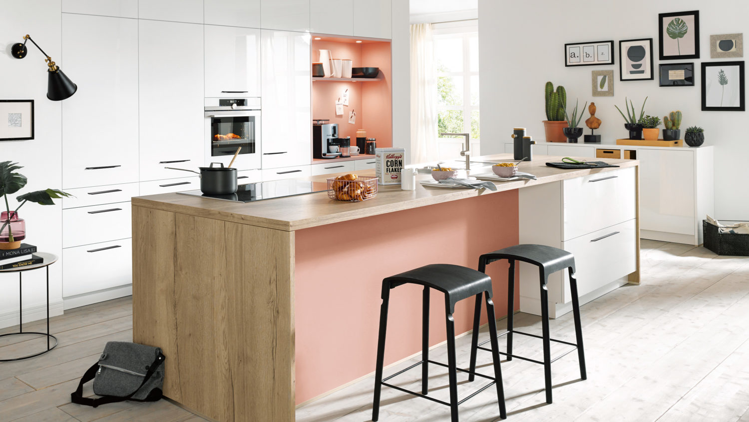 german kitchen in dubai by schüller. exclusively with goettling interiors in UAE. contemporary style glossy white kitchen with accents of peach. light oakwood worktop