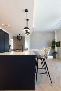 KH South Ridge Tower Apartment Kitchen Project by Goettling Interiors